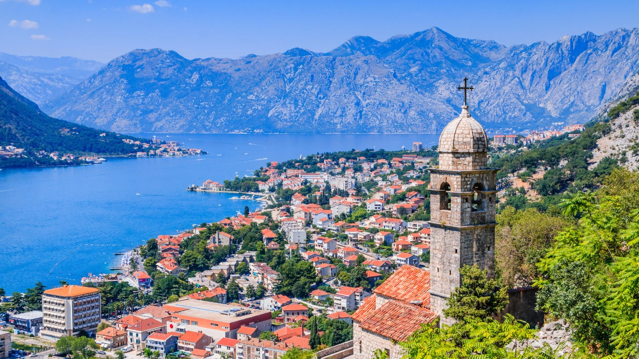 A bright landscape photo of the viewpoint over Koto in Montenegro.