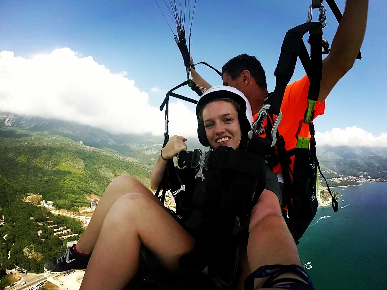 GoPro selfie of Justyn paragliding over Budva in Montenegro