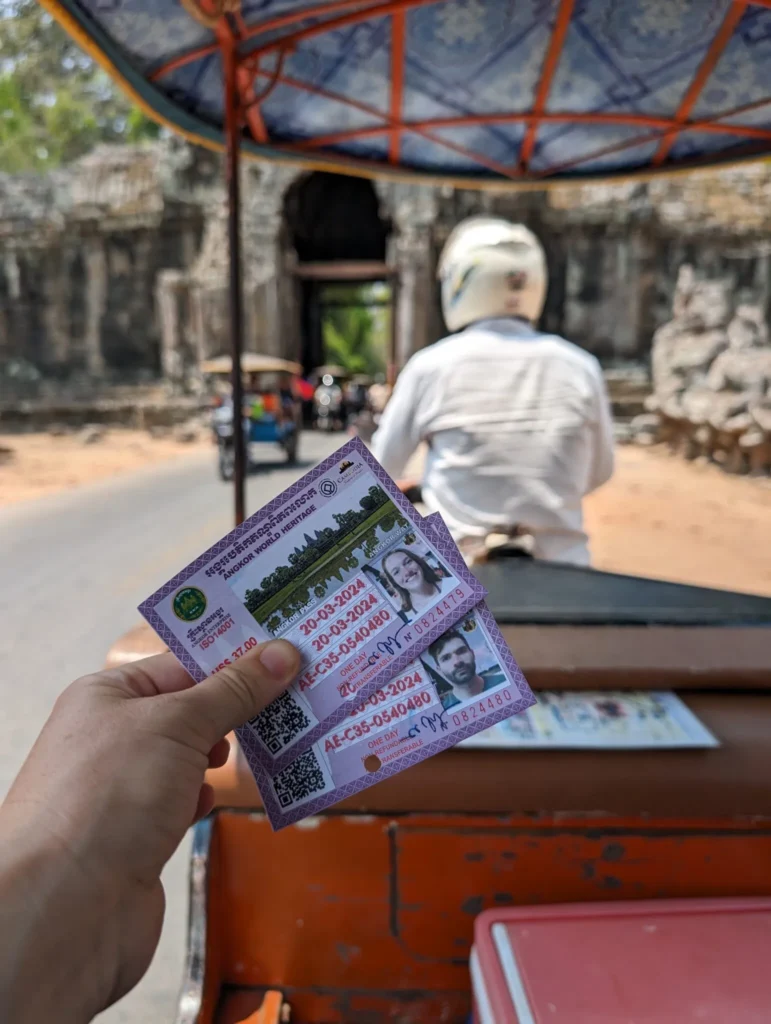 Our tickets to Angkor Wat, taken in our TukTuk on the bridge. 