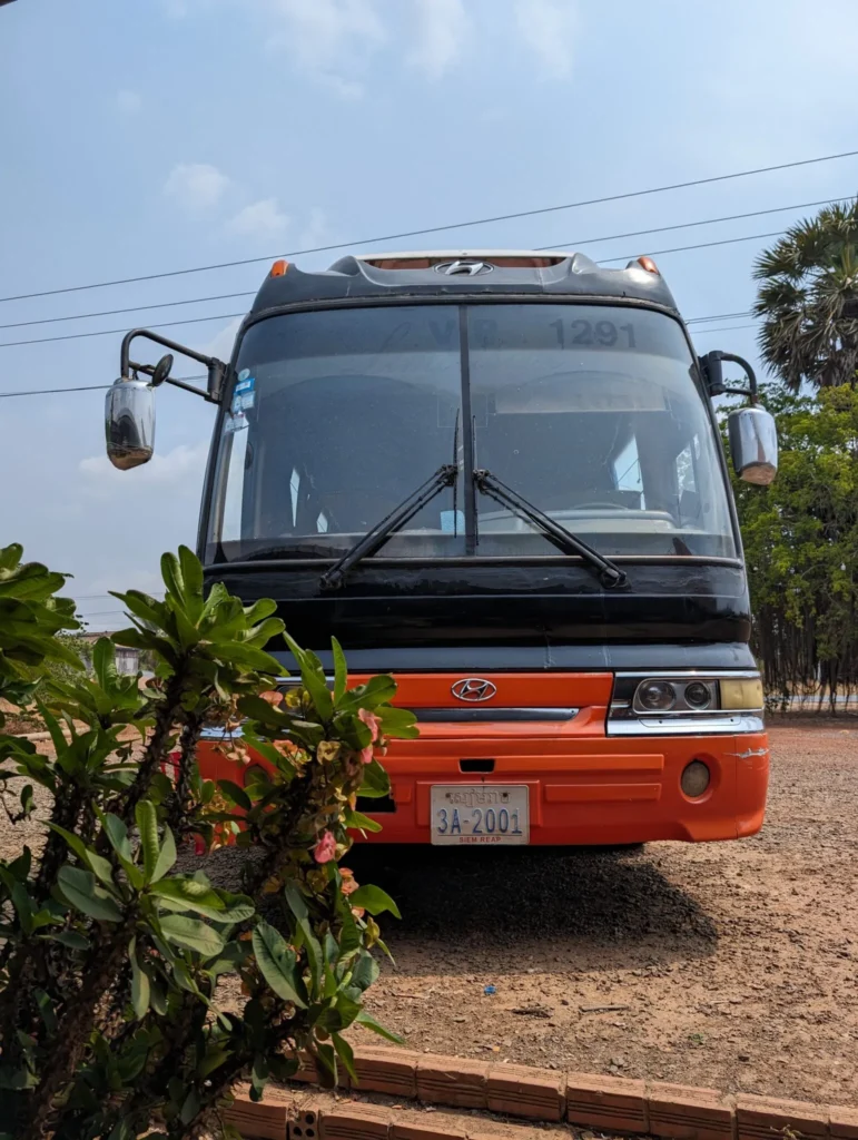 The bus stopped on the way to Phnom Penh.