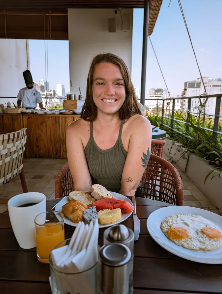 Justyn having breakfast at Phnom Penh Hotel.