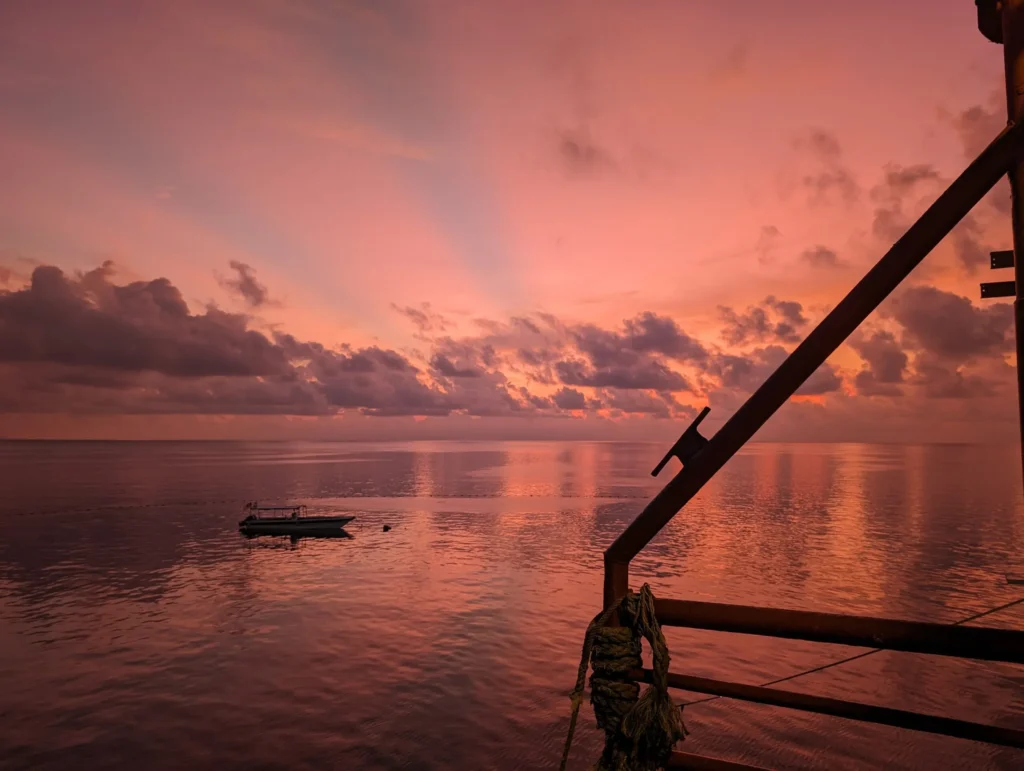 A beautiful pink sunrise on the Seaventures Dive Rig.