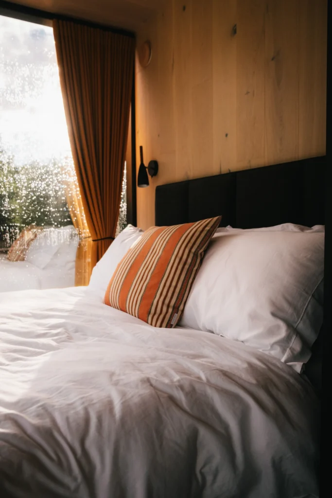 A close up of the bed and pillow at OOD Mirrow House Pound Farm.